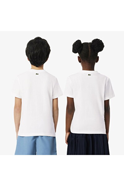 Lacoste Παιδικό λευκό μπλουζάκι με στάμπα με λαιμόκοψη