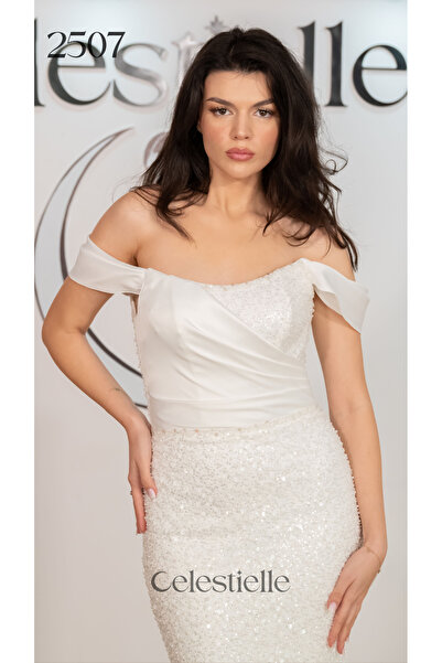 Celestielle Mermaid wedding dress in taffeta with sequins and off-the-shoulder sleeves