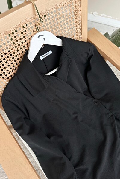 Kombinazon Μαύρη μπλούζα Loram με πλαϊνά κορδόνια