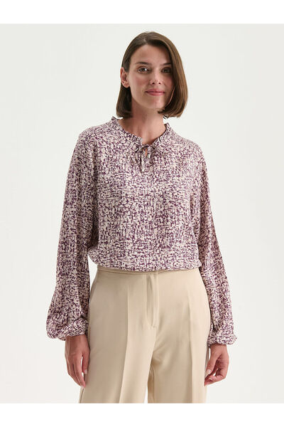 LC Waikiki Cey Yeni Sezon Bağlamalı Yaka Desenli Bluz