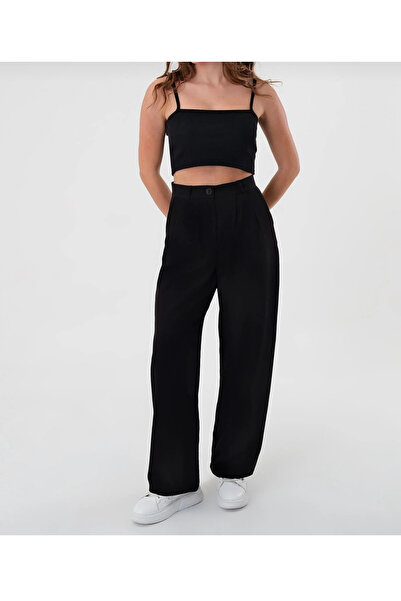 QUMRULİFE بنطلون أسود من قماش الليكرا مع أزرار للإغلاق