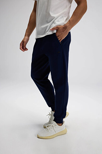 Ellesse Βαμβακερό παντελόνι με κανονική εφαρμογή και κανονική μέση με ριμπάνι στο πόδι Ανδρικό παντελόνι EM554