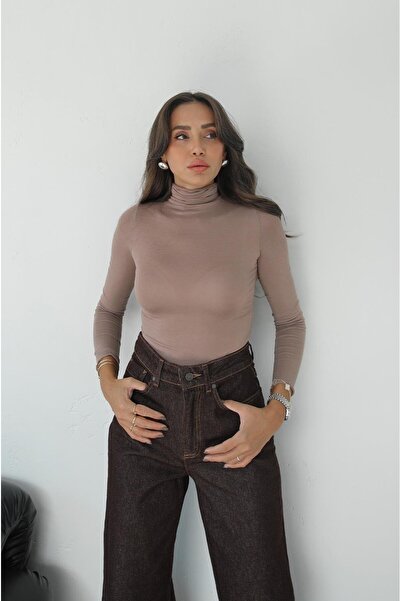 Havoş Průsvitná halenka s rolákem z norkové kožešiny