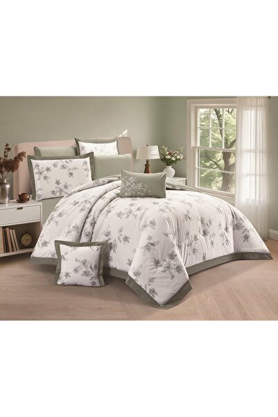 SNOOZYL A king-size bed sheet with a floral design and a cotton filling to add elegance and beauty.
