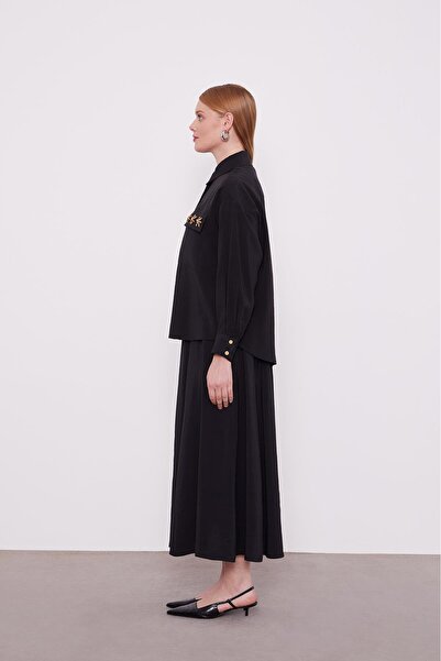 Levidor Σετ φούστας με μαύρες χάντρες και λεπτομέρεια μαργαρίτας