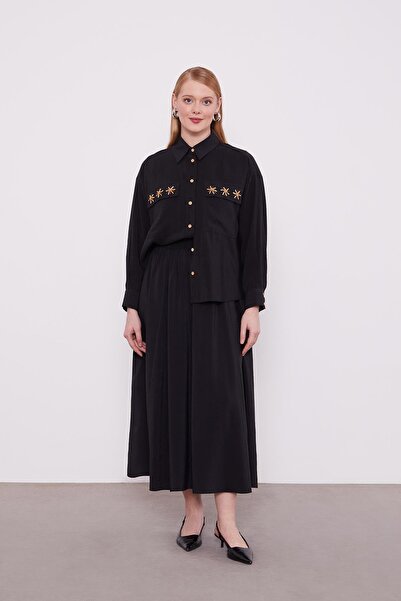 Levidor Σετ φούστας με μαύρες χάντρες και λεπτομέρεια μαργαρίτας