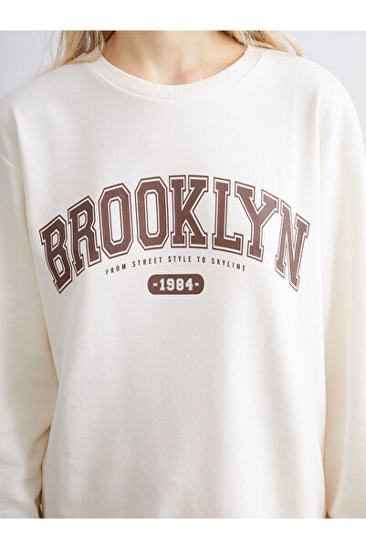 LC Waikiki Γυναικείο φούτερ Crew Neck Brooklyn Printed (W5)