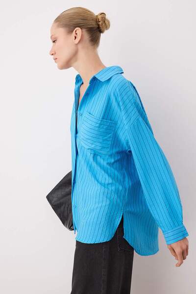 Trendyol Collection Світло-блакитна сорочка з кишенями та деталями Oversize TWOAW26GO00073