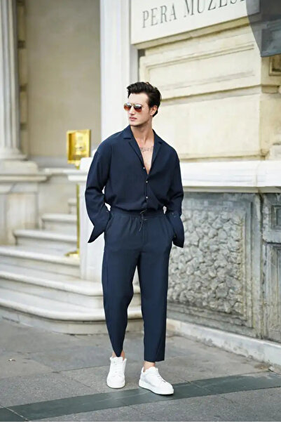 MODEFENDİ طقم رجالي باللون الأزرق الداكن ذو أرجل غير متماثلة ونمط مموج من الأ...