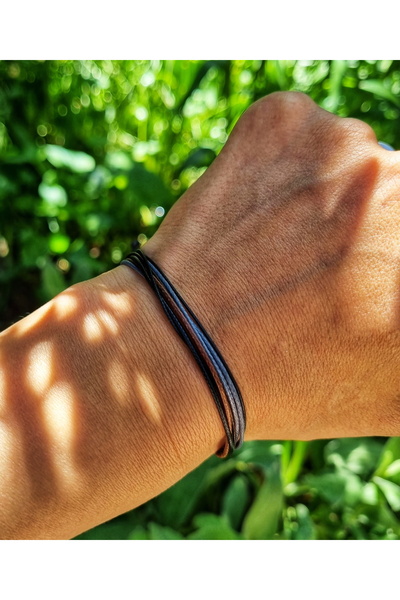 Wild Bracelets Adjustable bracelet made of several waxed cords, Dark grey by