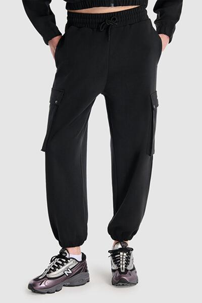 New Balance WNP1529 بنطال رياضي نسائي أسود