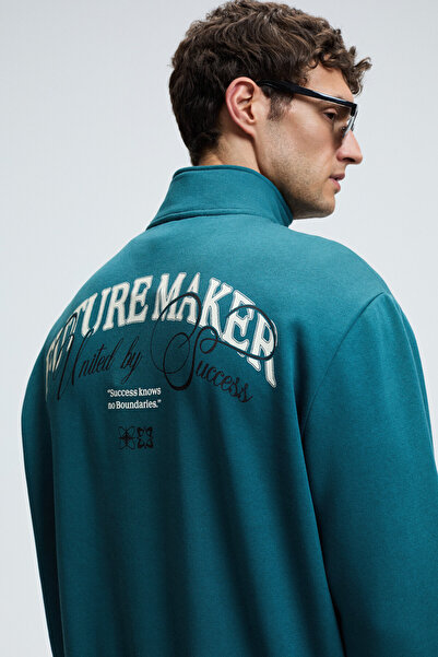 GRIMELANGE MERRICK Ανδρικό πουλόβερ με στάμπα στην πλάτη, κέντημα στην τσέπη, μισό φερμουάρ, ελαστικό λαιμόκοψη, κανονική εφαρμογή, πράσινο Swe