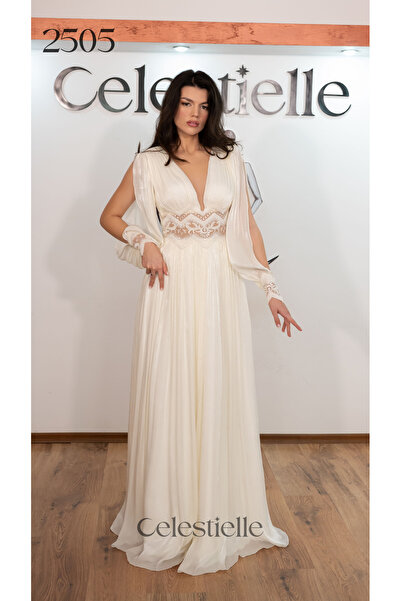 Celestielle A-line wedding dress with long sleeves, embroidery and puff sleeves