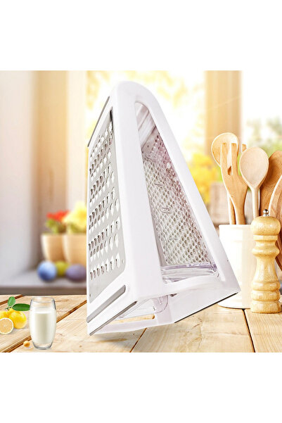 Flippy Kitchen grater with Flippy collection box, two types of blades, stainless steel and ABS housing, design