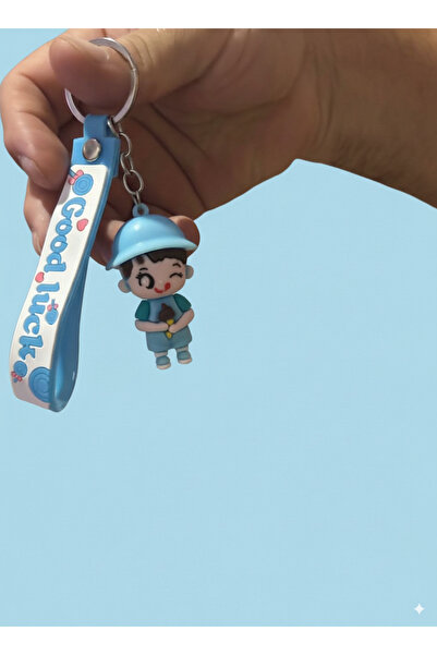 HARİNA سلسلة مفاتيح ثلاثية الأبعاد من السيليكون على شكل طفل يرتدي قبعة زرقاء مع عبارة 'الحظ السعيد'، زينة للحقائب