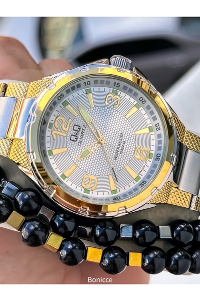 Q&Q ساعة يد رجالية، سوار فولاذي بلون أصفر فضي، مقاومة للماء حتى 5 ضغط جوي، مع...