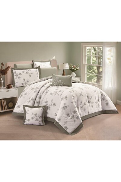 SNOOZYL A king-size bed sheet with a floral design and a cotton filling to add elegance and beauty.