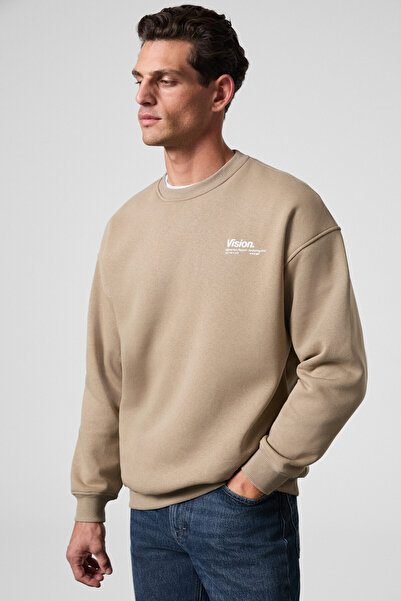 GRIMELANGE Ανδρικό φούτερ Ernest από οργανικό βαμβάκι με μαλακή στάμπα με λεπτομέρεια, λαιμόκοψη και εσωτερικό φλις μπεζ