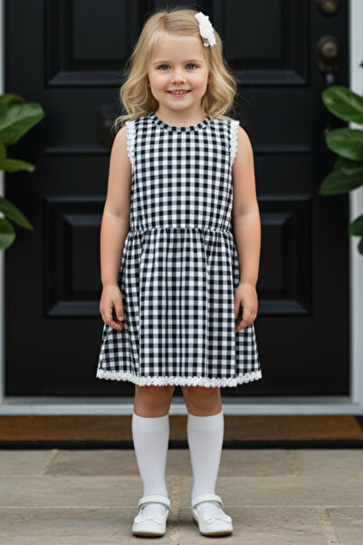 Parla Kids 0019 - Сукня для дівчинки в чорно-білу клітинку з комплектом шпильок