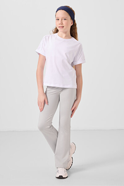 TOMMY LIFE Еластичні штани з камуфляжним принтом для дівчаток - 75193