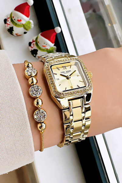 Tom Jones ساعة يد نسائية مقاومة للماء 3 ATM ذهبية اللون - سوار من الفولاذ Dkh4560c1