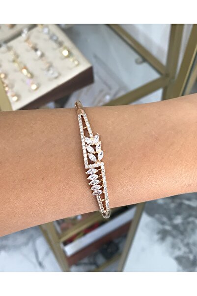 the ASEL İNCİ سوار برونزية بتصميم حجر الأوراق