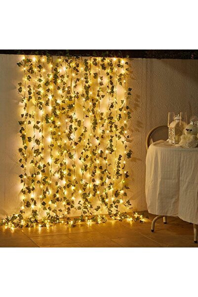 Generic سلسلة من أضواء الروطان الخارجية مع نباتات وكروم واقعية لتزيين الفناء