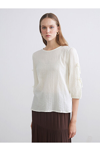 LC Waikiki Bluză texturată cu guler rotund Özmarka, colecția nouă