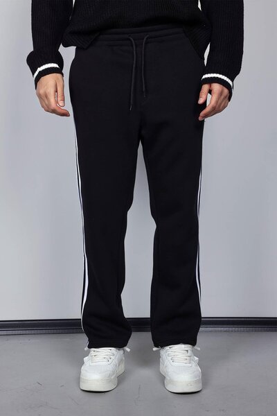 ablukaonline Мъжки панталони с странични ивици и широка кройка, черни