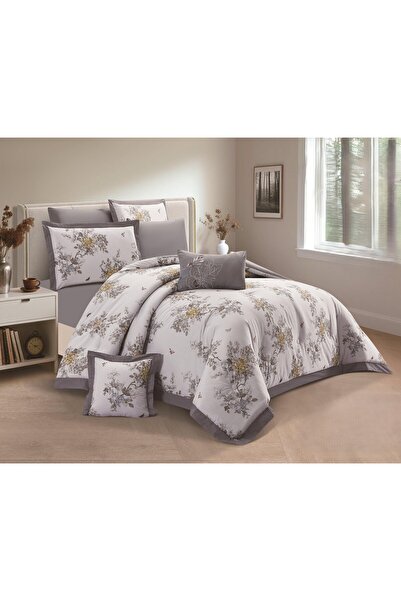 SNOOZYL A king-size bed sheet with a floral design and a cotton filling to add elegance and beauty.