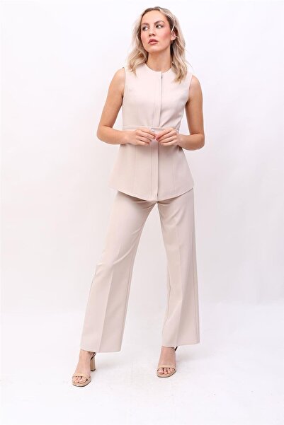 ÖNDER ÖZSOY طقم سترة بحزام وبنطلون واسع الساق - بيج