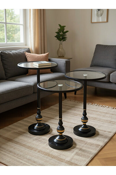 Living مجموعة من ثلاث طاولات زجاجية بإطار فولاذي أسود ولمسات ذهبية أنيقة