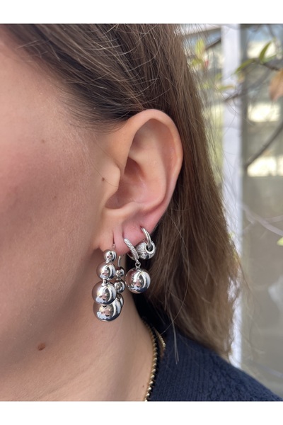 TUĞÇE TURAP 3’lü Gümüş Renk Kararmaz Çelik Küpe Seti – Halka ve Top Detaylı Model