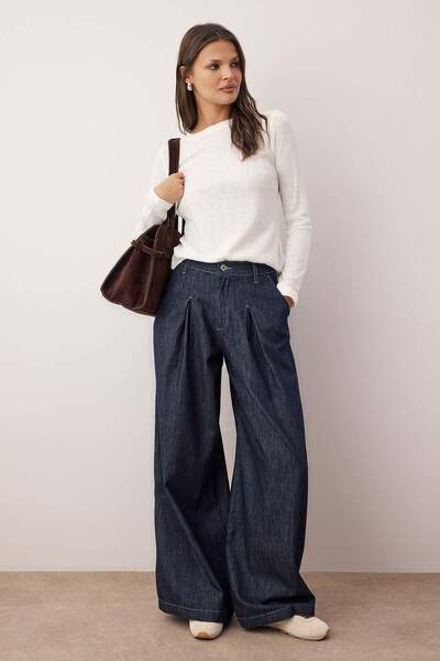 Trendyol Collection Wardrobe Essentials – Ecru Knitwear Look Gestrickte Bluse |   TWOAW26BZ00150 aus Englisch ins Deutsche.