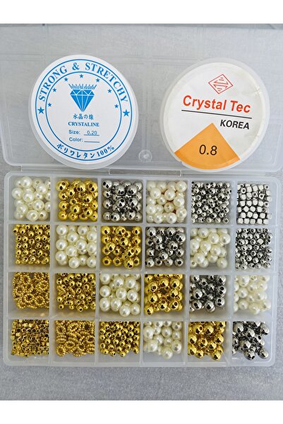 yağmur gökçe NO:120-24 BÖLMELİ KUTUDA İNCİ VE ALTIN GÜMÜŞ RENKLİ TAKI BİLEKLİ...