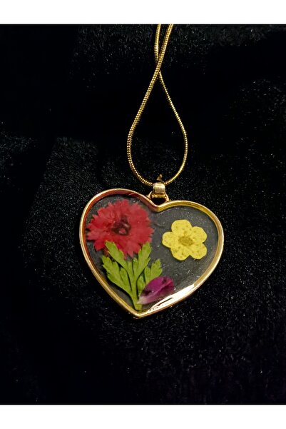 Tasarım قلادة على شكل زهرة طبيعية من الفولاذ باللون الذهبي