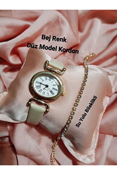 Brality Vintage Oval Model Kadın Kol Saati BEJ RENK Kordonlu Yeni Sezon Gold Kasa SU YOLU BILEKLİKLİ tt0057
