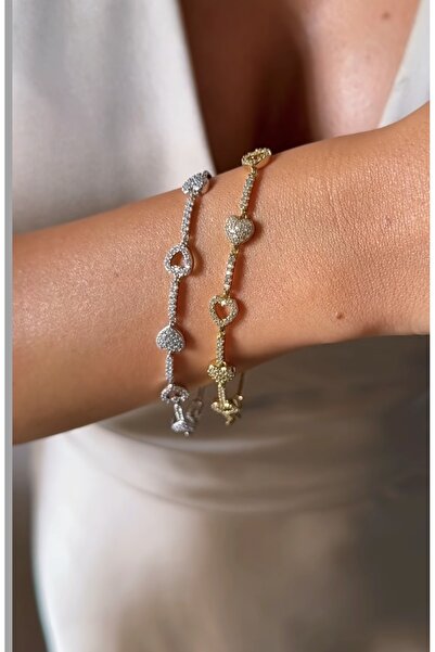 AychaAksesuar سوار شوبينغ ذهبي اللون مرصع بحجر الزركون على شكل قلب لا يفقد لونه