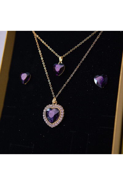 velve Danser a Deux accessory set, made of stainless steel, with earrings, a necklace with two chains and a pendant with stones, Purple