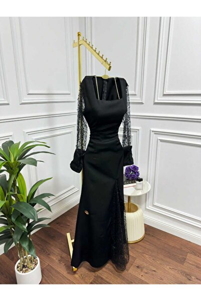 Riva Long and elegant black evening dress
