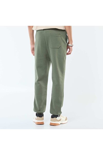KIABI Plain joggers with drawstrings at the waist GREEN
