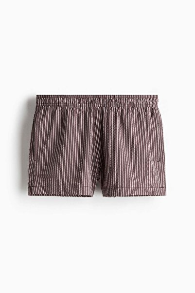 H&M شورت سباحة من قماش السيراكر