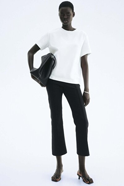 H&M Flared crease-front trousers