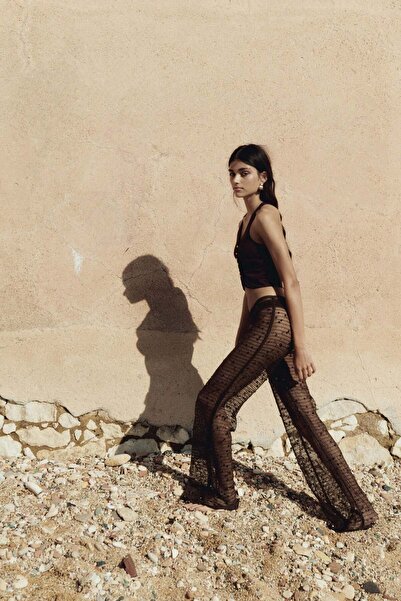 H&M Sequined net trousers
