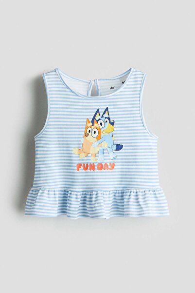 H&M بلوزة ببلوم بنقشة مطبوعة