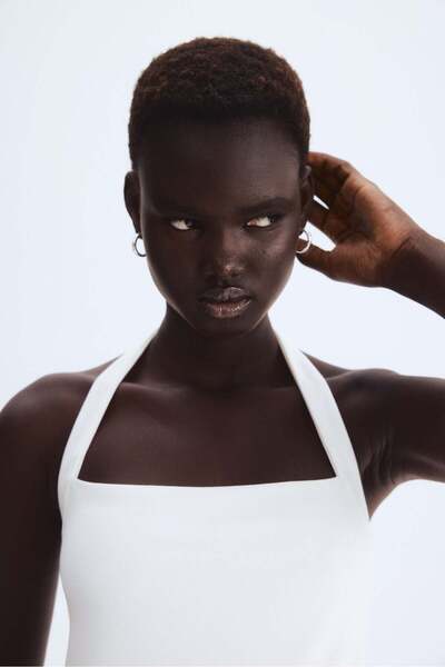 H&M صدرية بدون ياقة