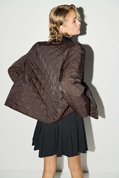 H&M سترة مبطنة بياقة مخملية