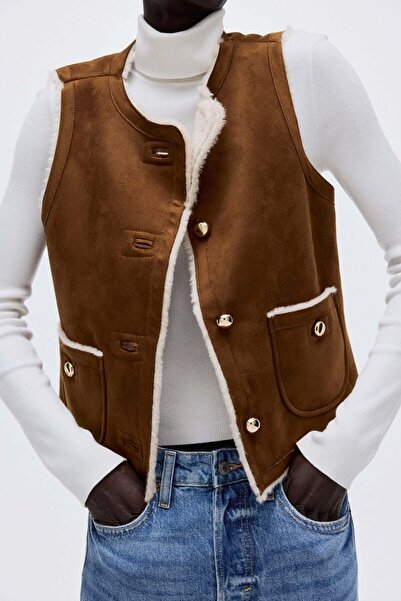 H&M سترة مبطنة بالوبر