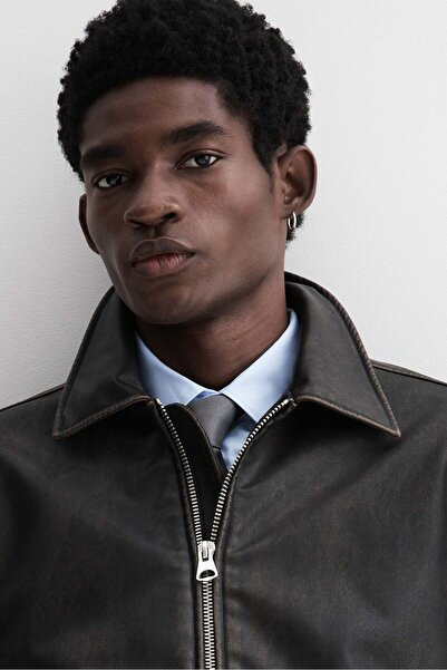 H&M سترة فضفاضة بمظهر مغسول