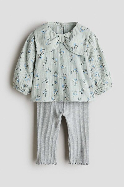 H&M طقم مكون من قطعتين بلوزة وبنطال ضيق